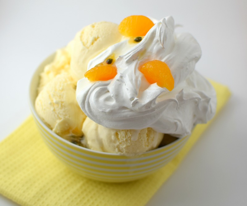 Italian meringue and mandarin on top of ice cream