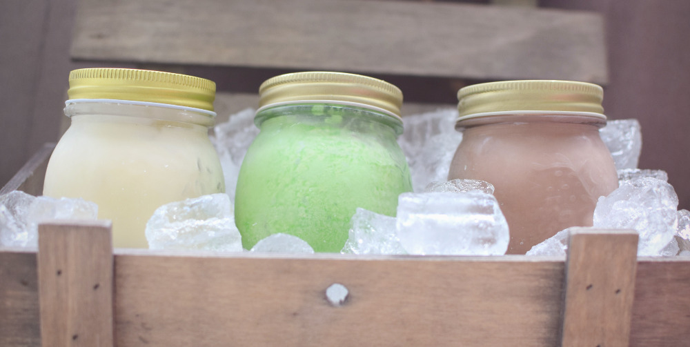 Mason jars of ice cream in an ice box