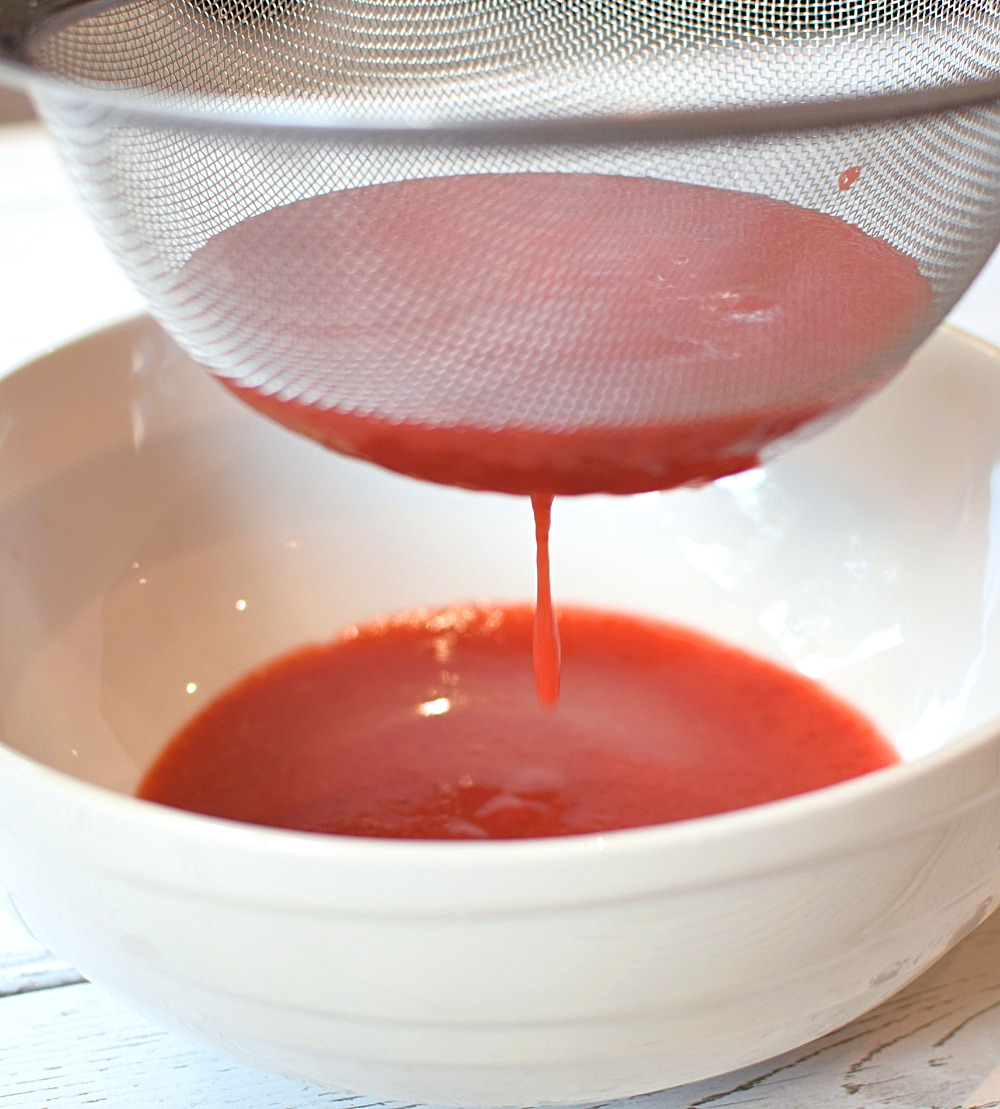 Straining the strawberries