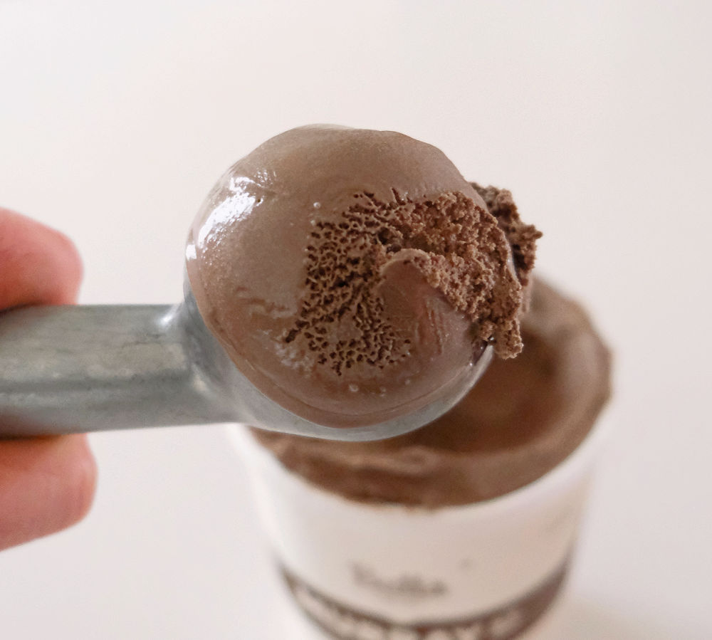 Macro image of an old fashioned scoop full of choc ice cream