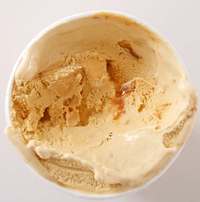A top down photo of the contents of a pack of Bulla Caramel Swirl and Shortbread Pieces Ice Cream.