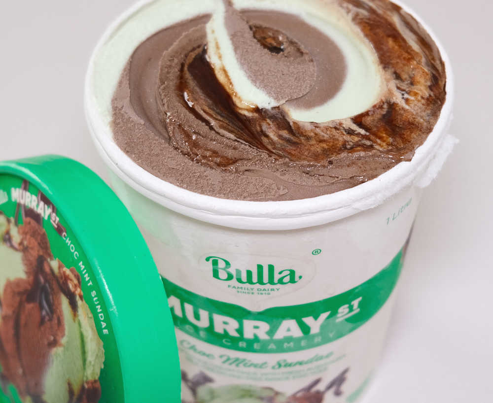 Closeup of an opened container of Murray St Choc Mint Sundae ice cream.