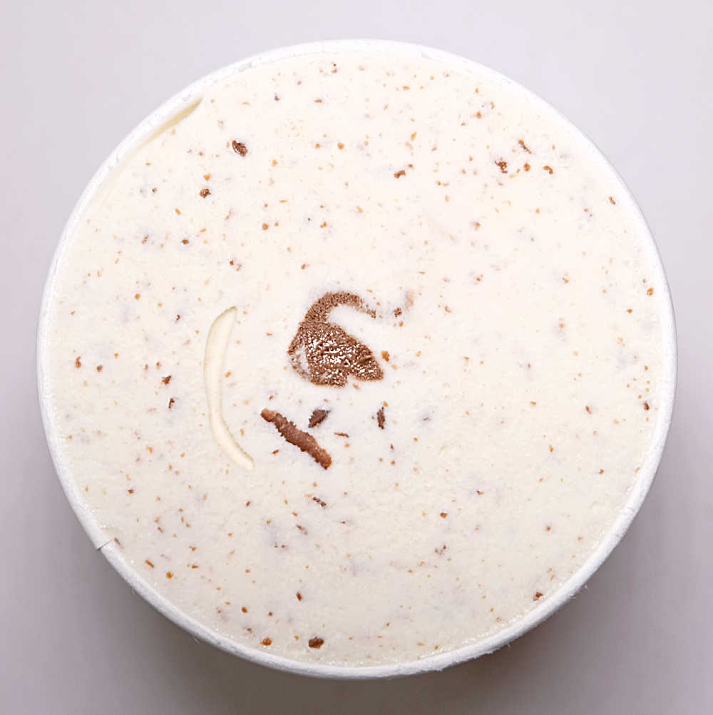 Top down image of a full tub of Cadbury Dairy Milk.