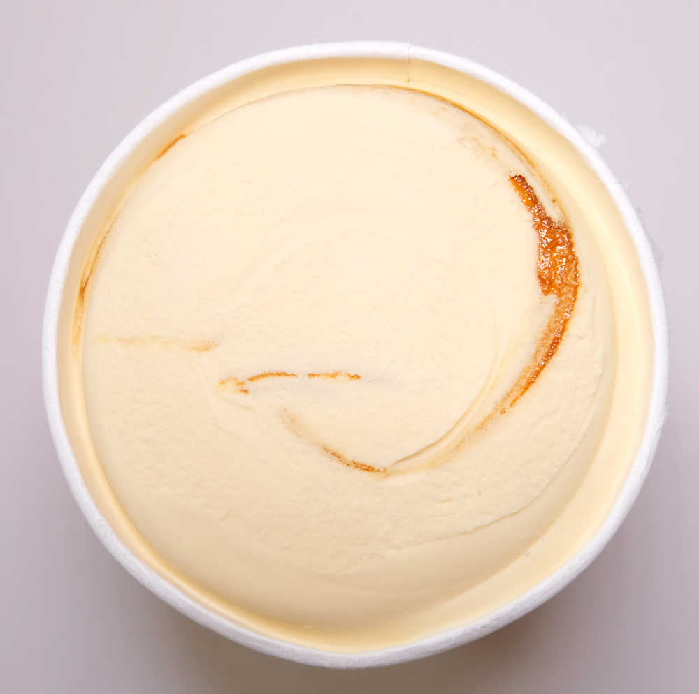 Top down image of Murray St Banoffee ice cream with the lid off, unscooped.