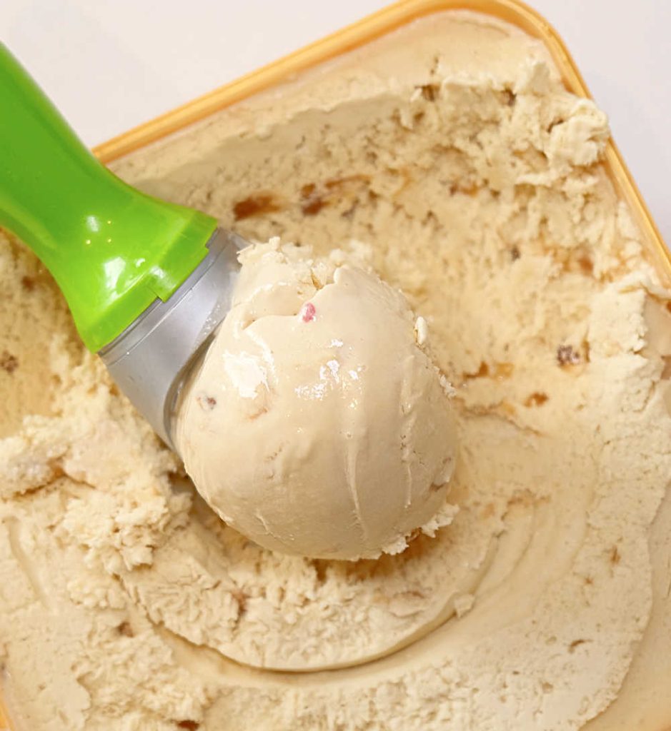 A closeup of a scoop of Awesome Salted Caramel Seduction Ice Cream.
