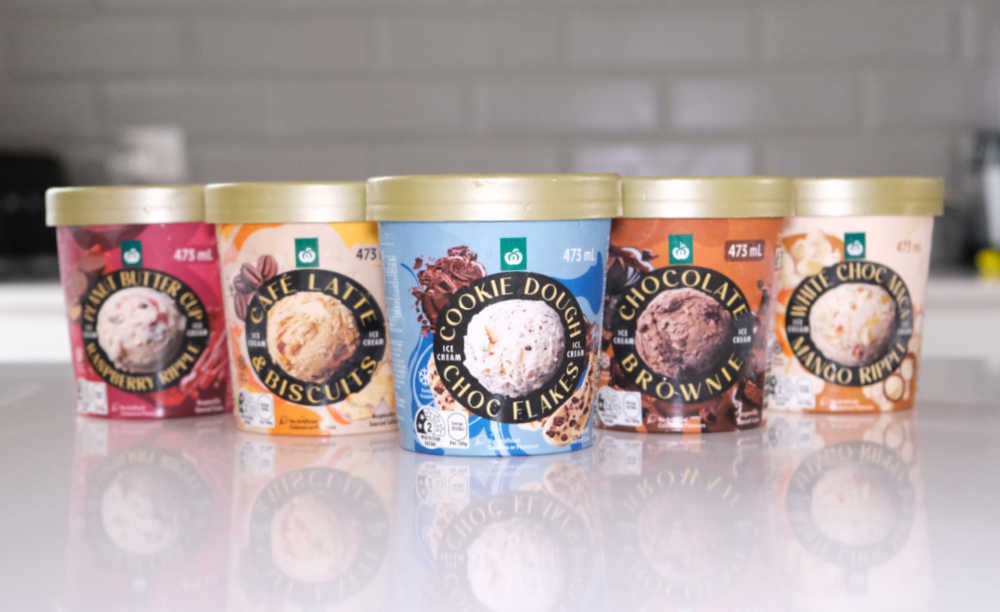 A line of ice cream tubs from the Woolworths 473ml range.