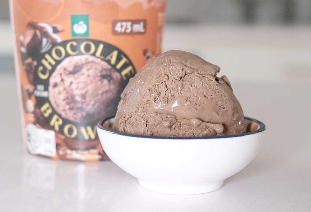 A bowl full of choc brownie ice cream by Woolworths.