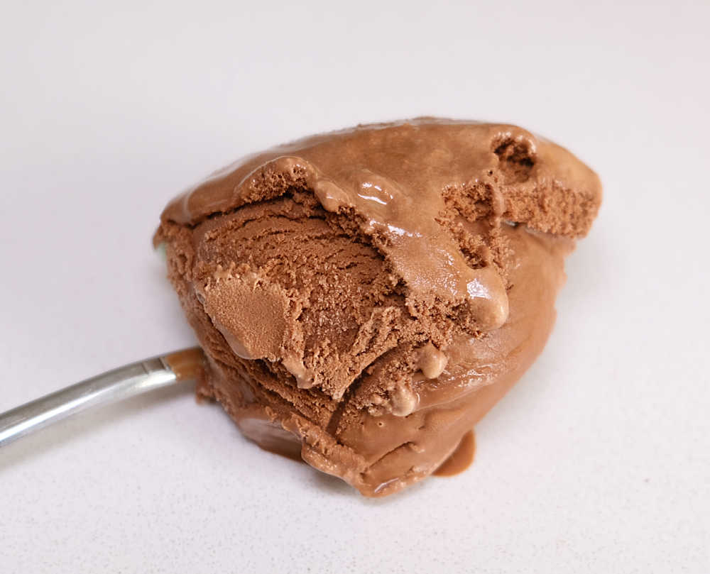 Much Moore Family Classic Chocolate Ice Cream in a spoon.