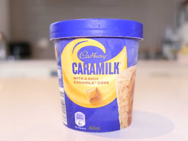 Front of Cadbury Caramilk Ice Cream Tub on a kitchen benach.