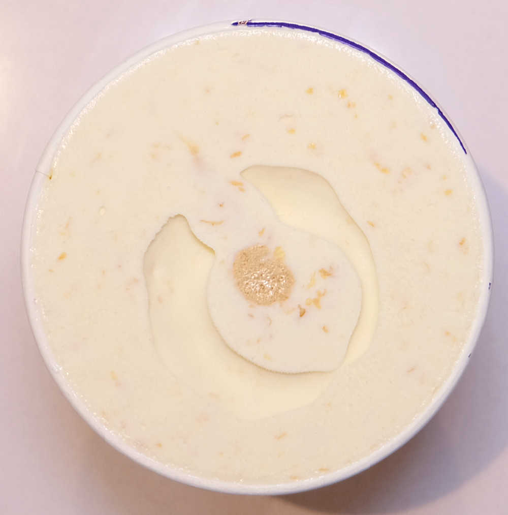 Top-down shot of an unscooped Caramilk tub.
