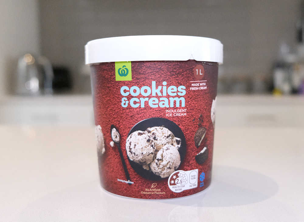 Front of pack shot of Woolworths Cookies and Cream Ice Cream 1L.