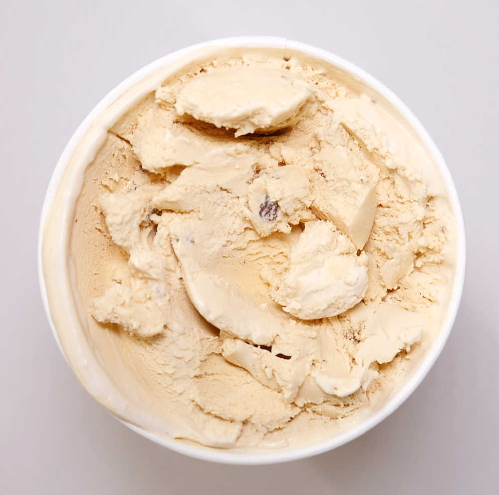 A top-down image of Rum and Raisin ice cream by Coles.