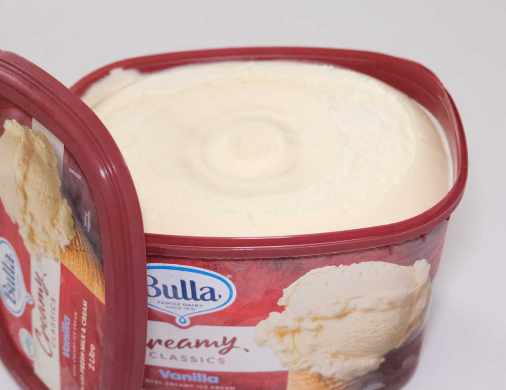 An unscooped tub of Bulla CC Van Ice Cream.