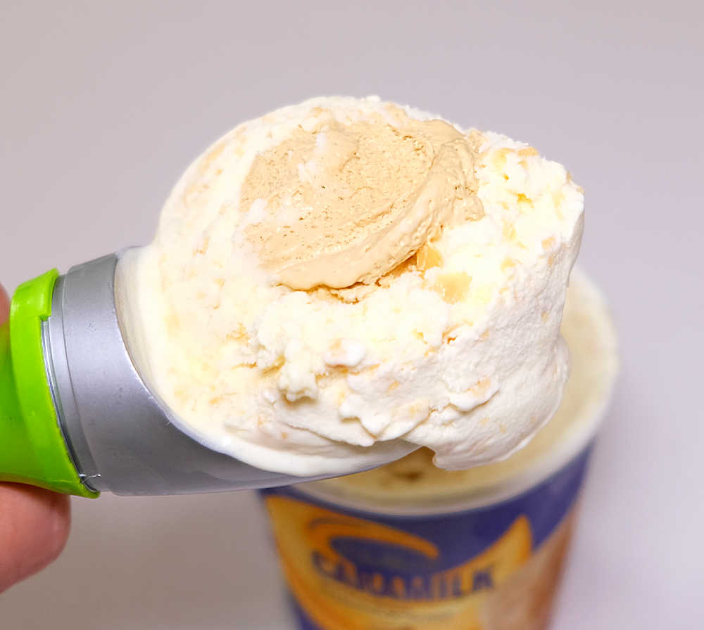 Macro image of a scoop of Cadbury Caramilk.