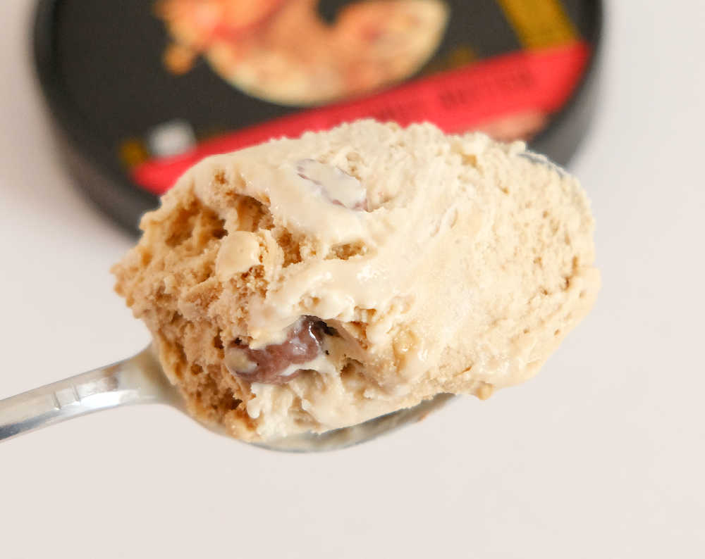 A spoonful of Crunchy Peanut Butter Ice Cream ready to eat.