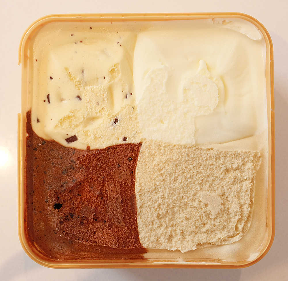 A top-down photo of an open container of Much Moore Awesome Foursome Cravings.
