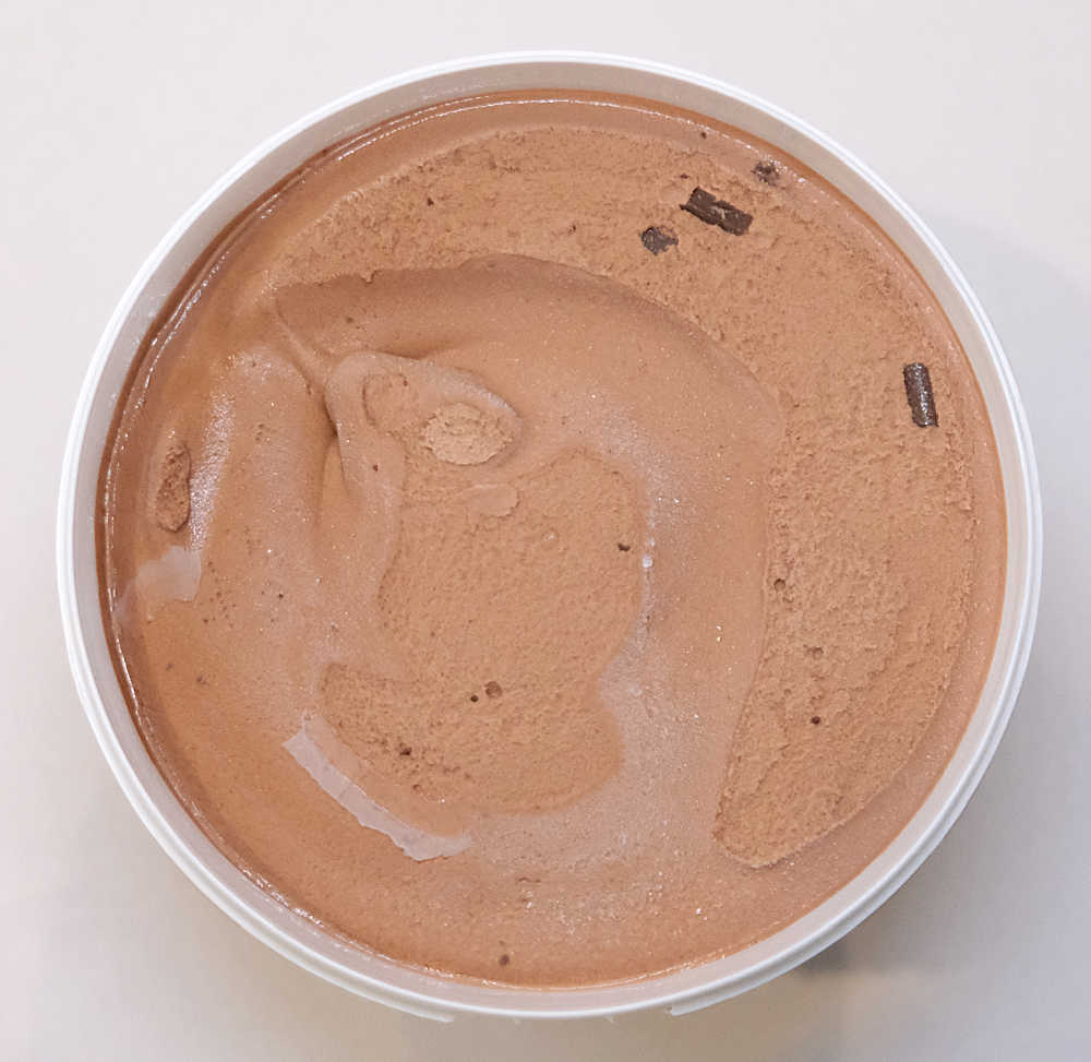 An unscooped pack of Triple Chocolate Ice Cream.