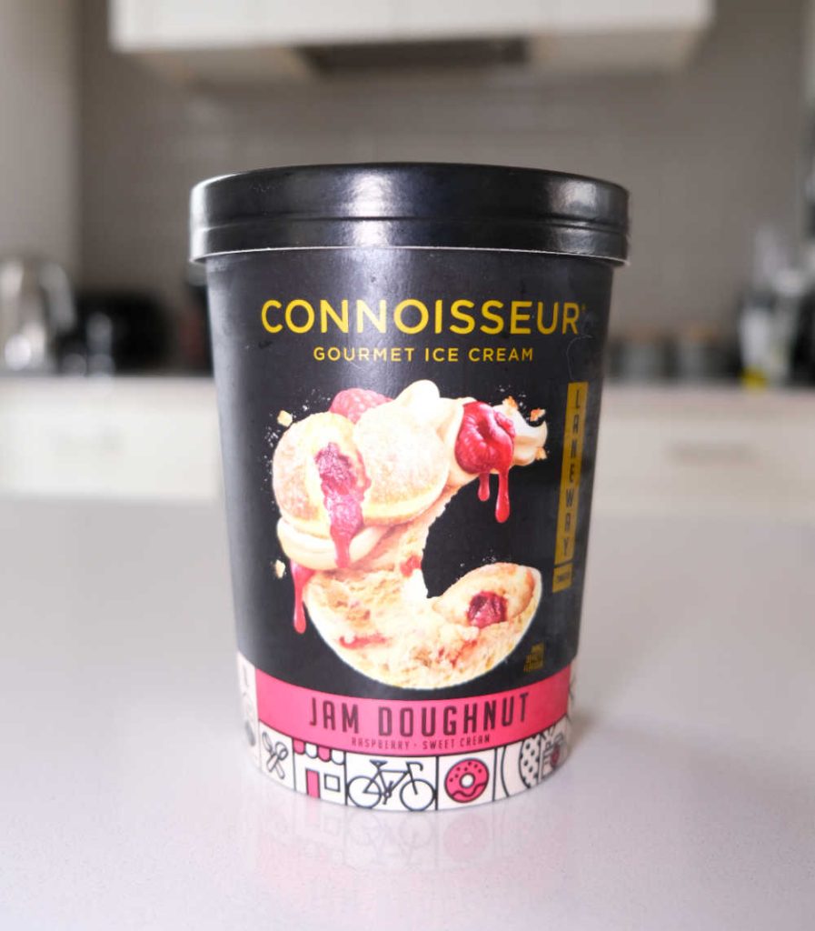 A vertical pack shot of Connoisseur Jam Doughnut Ice Cream.