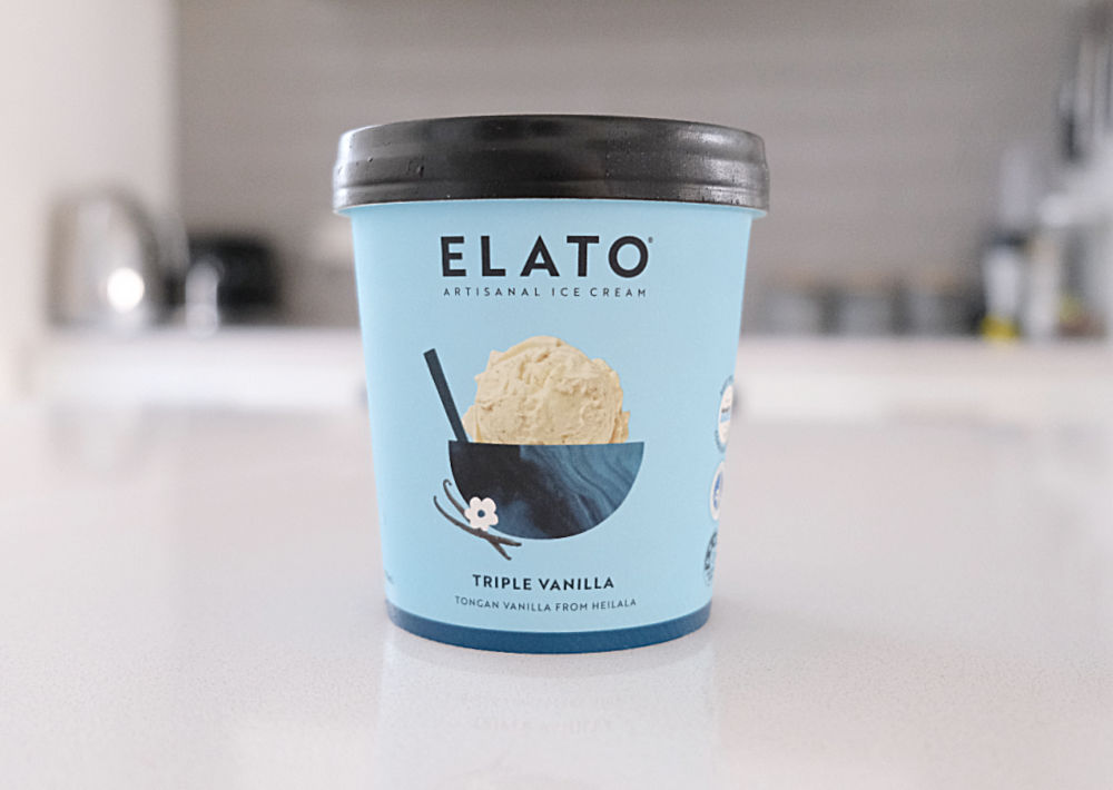 A tub of Elato Vanilla Ice Cream on the kitchen bench.