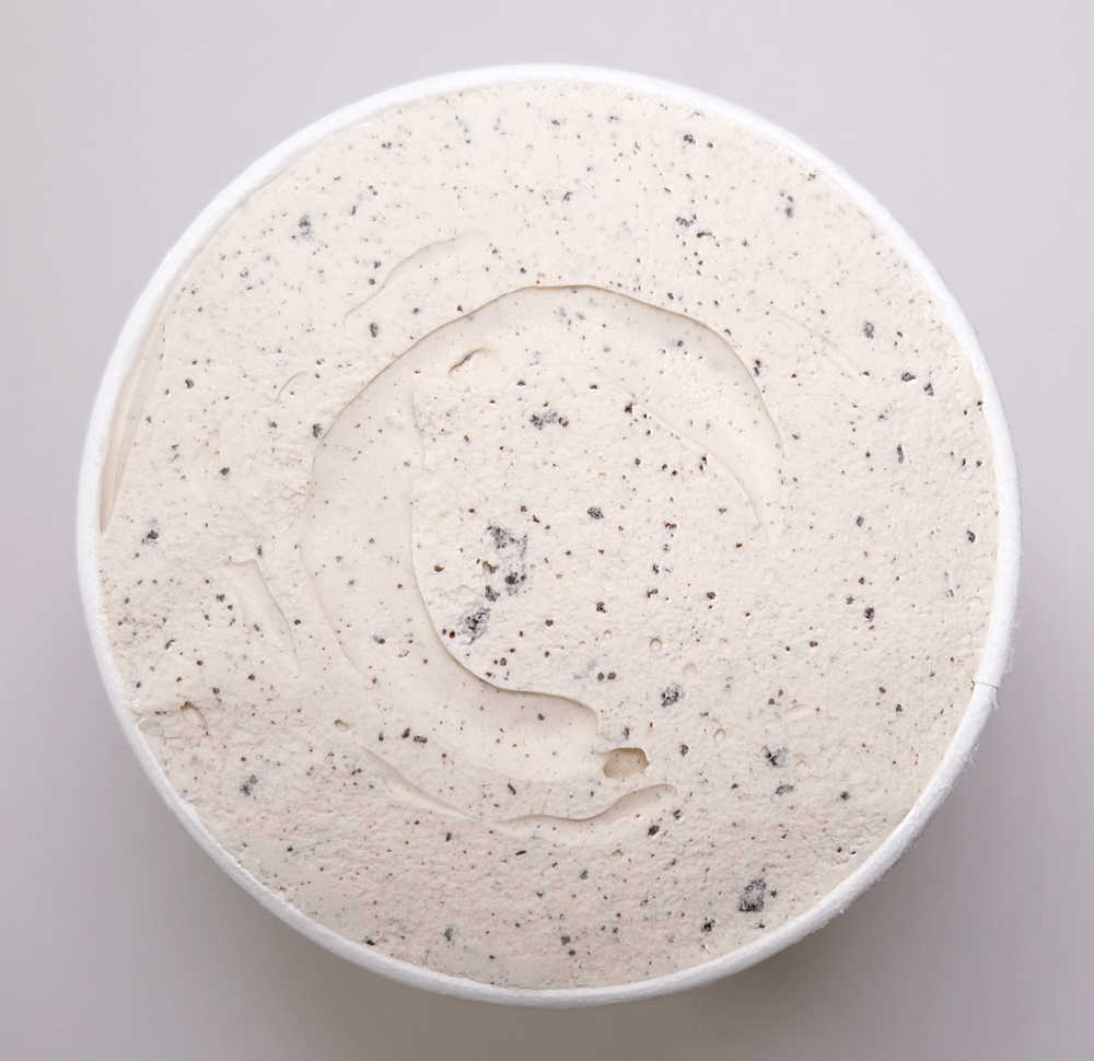 Birds eye shot of an unscooped pack of Aldi's Cookies and Cream Ice Cream.