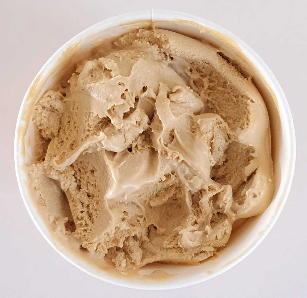 Bird's eye view of a partly eaten pack of Elato Coffee Ice Cream.