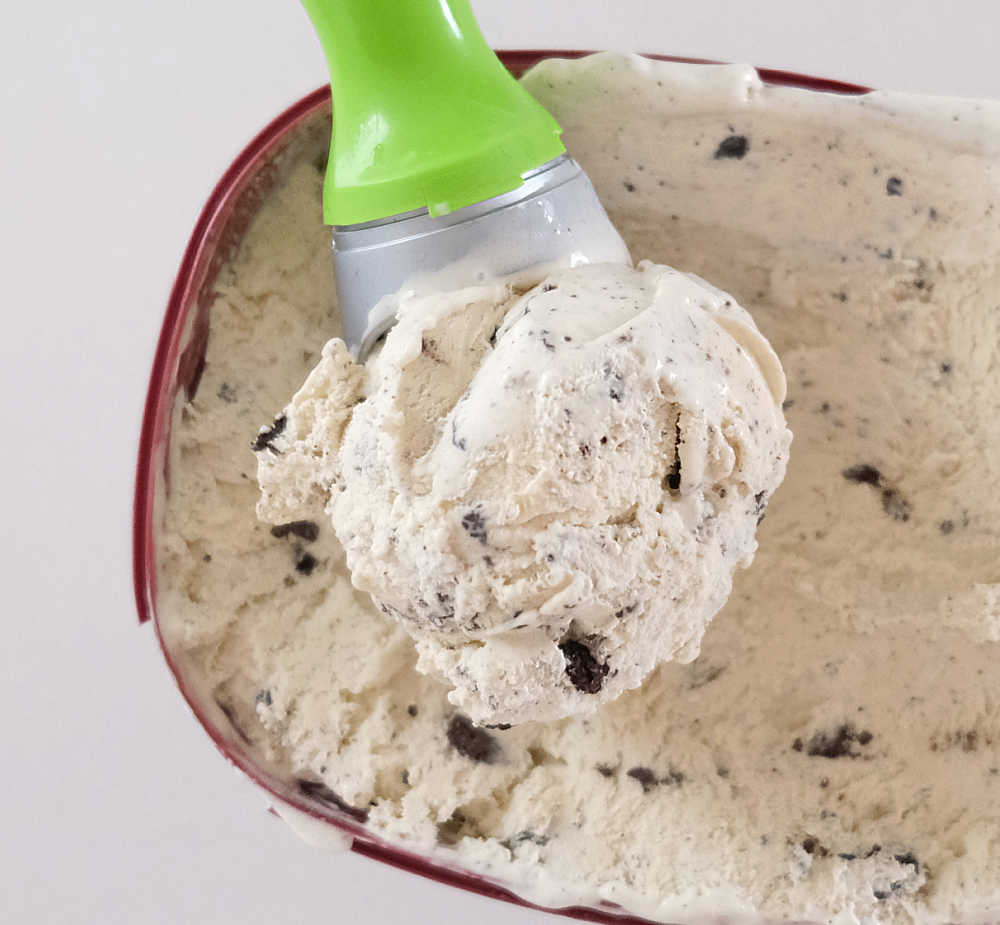 A bird's eye shot of a scoop of Creamy Classics C&C Ice Cream sitting on top of the pack.