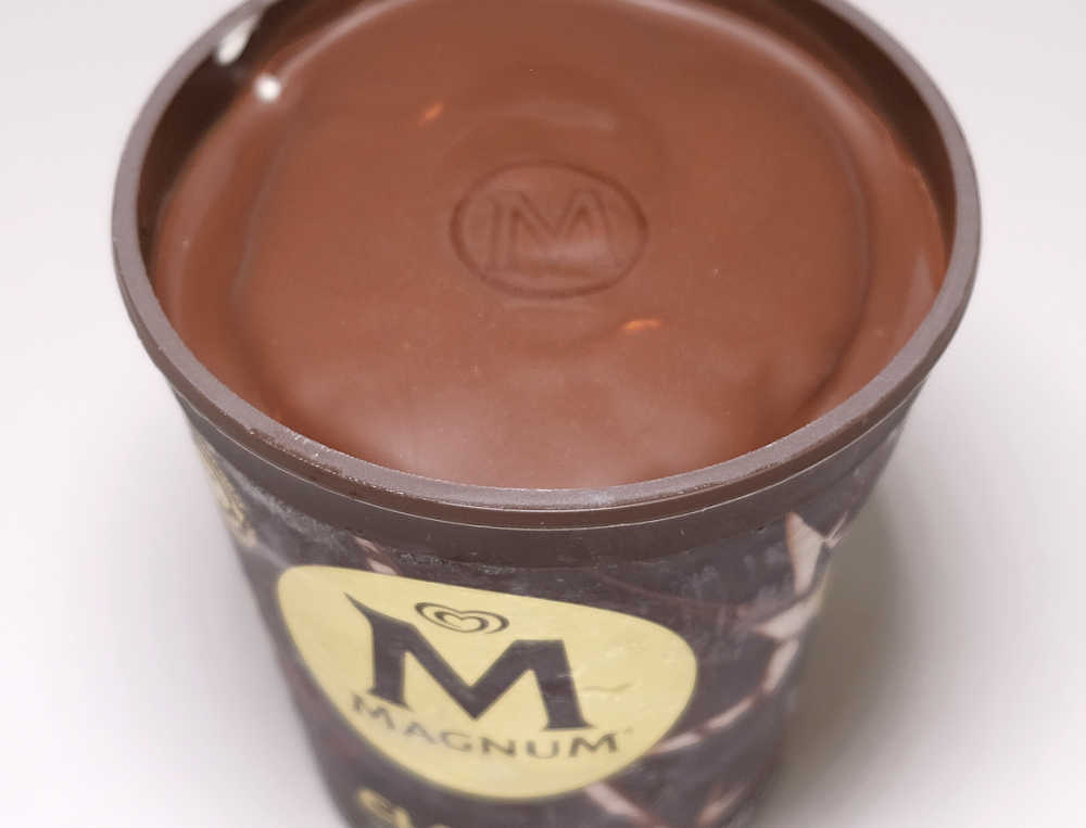 A look at the chocolate shell encasing Magnum Classic Ice Cream.