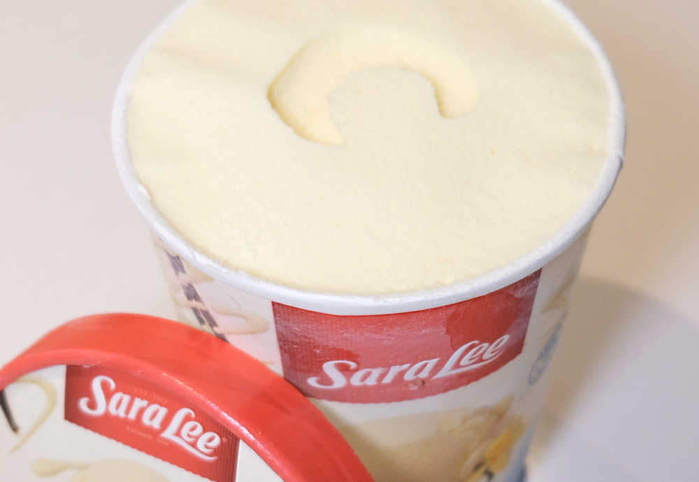 An unscooped pack of Sara Lee Van Ice Cream.