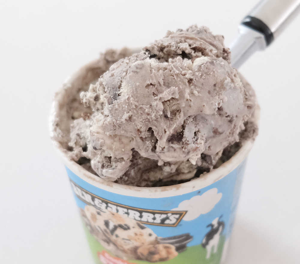 Closeup photo of a scoop ofBen & Jerry's Cookie Dough S'Wich Up ice cream.