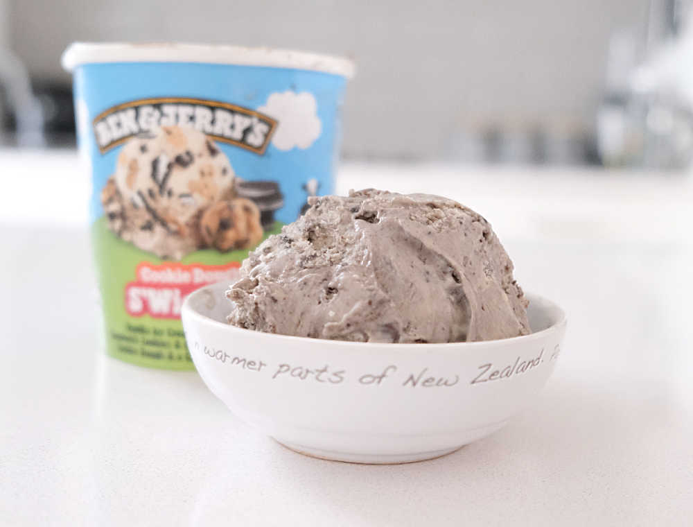 A bowl of BJ Cookie Dough S'Wich Up with the pack in the background.