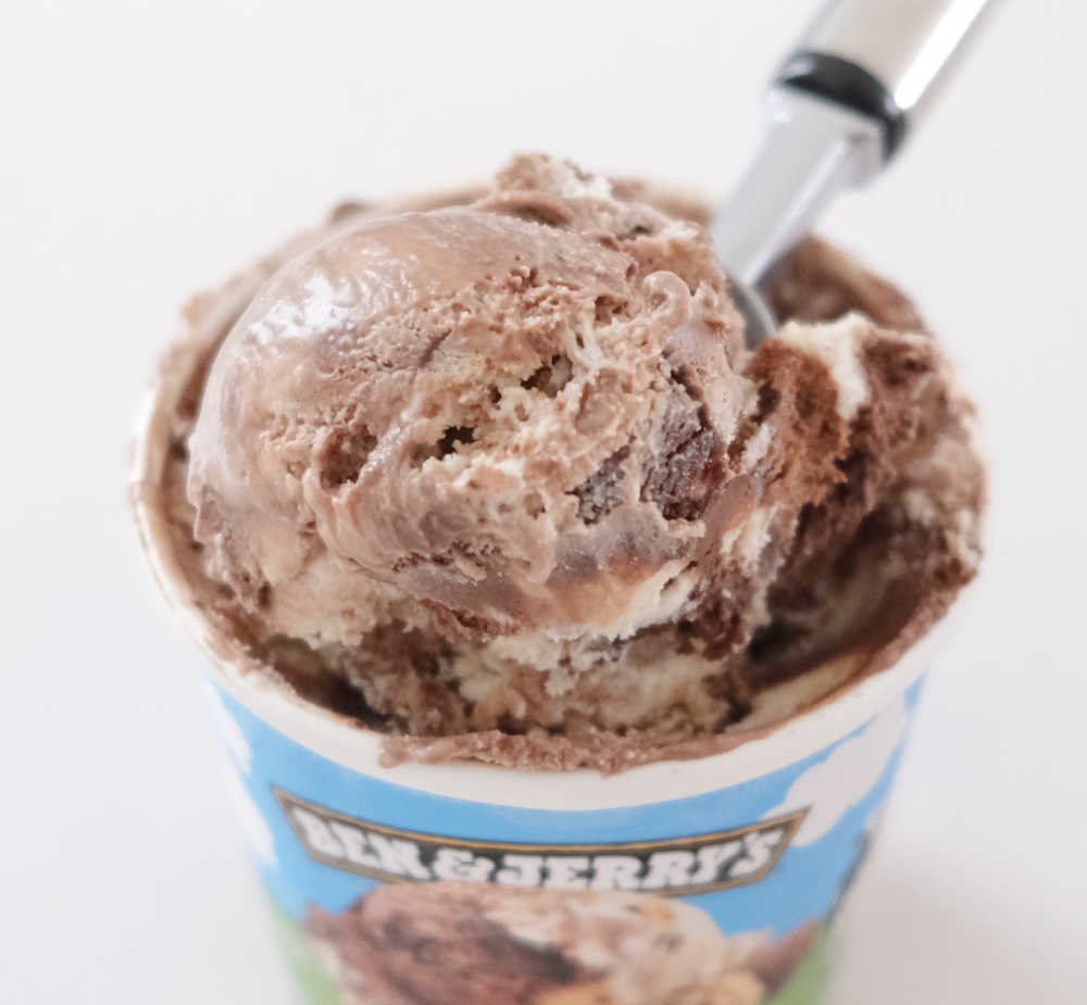 A scoop of Half Baked resting on the pack.