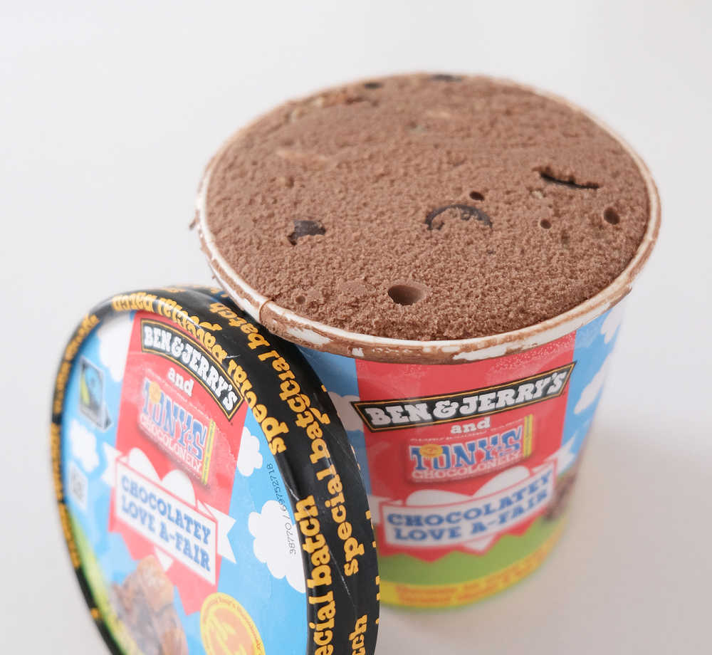 An unscooped pack of Ben & Jerry's Chocolatey Love A-Fair with the lid removed.
