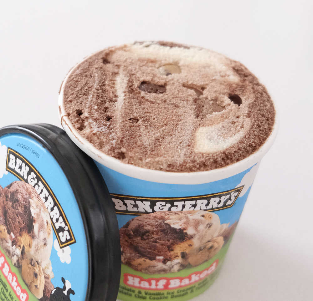 An open pint of unscooped B&J Half Baked.