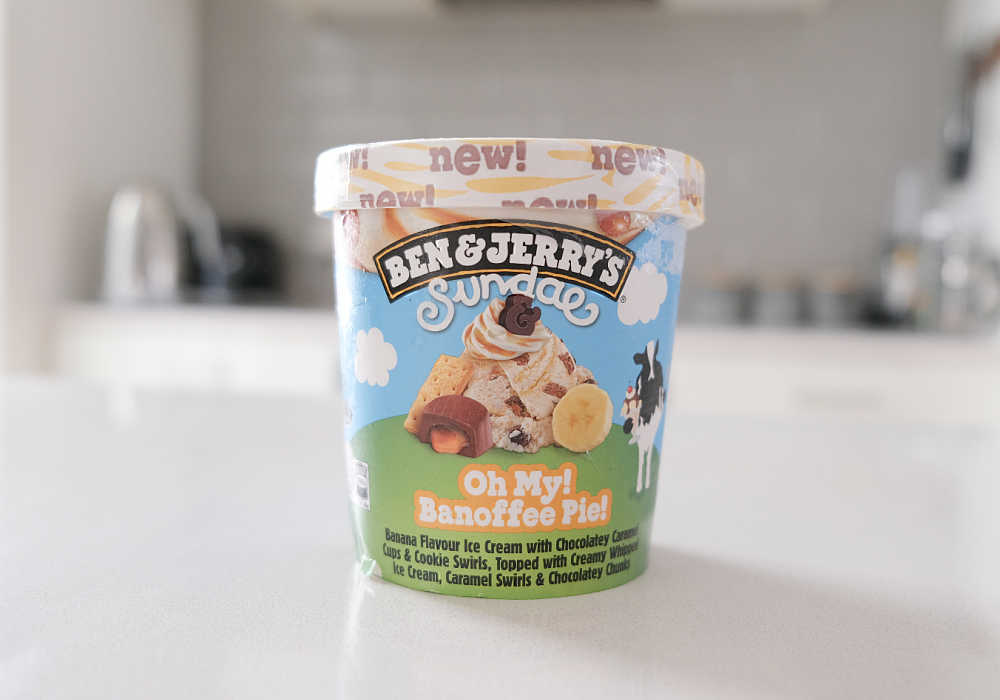 Pint of Ben and Jerry's Oh My! Banoffee Pie! Ice Cream on a kitchen bench.