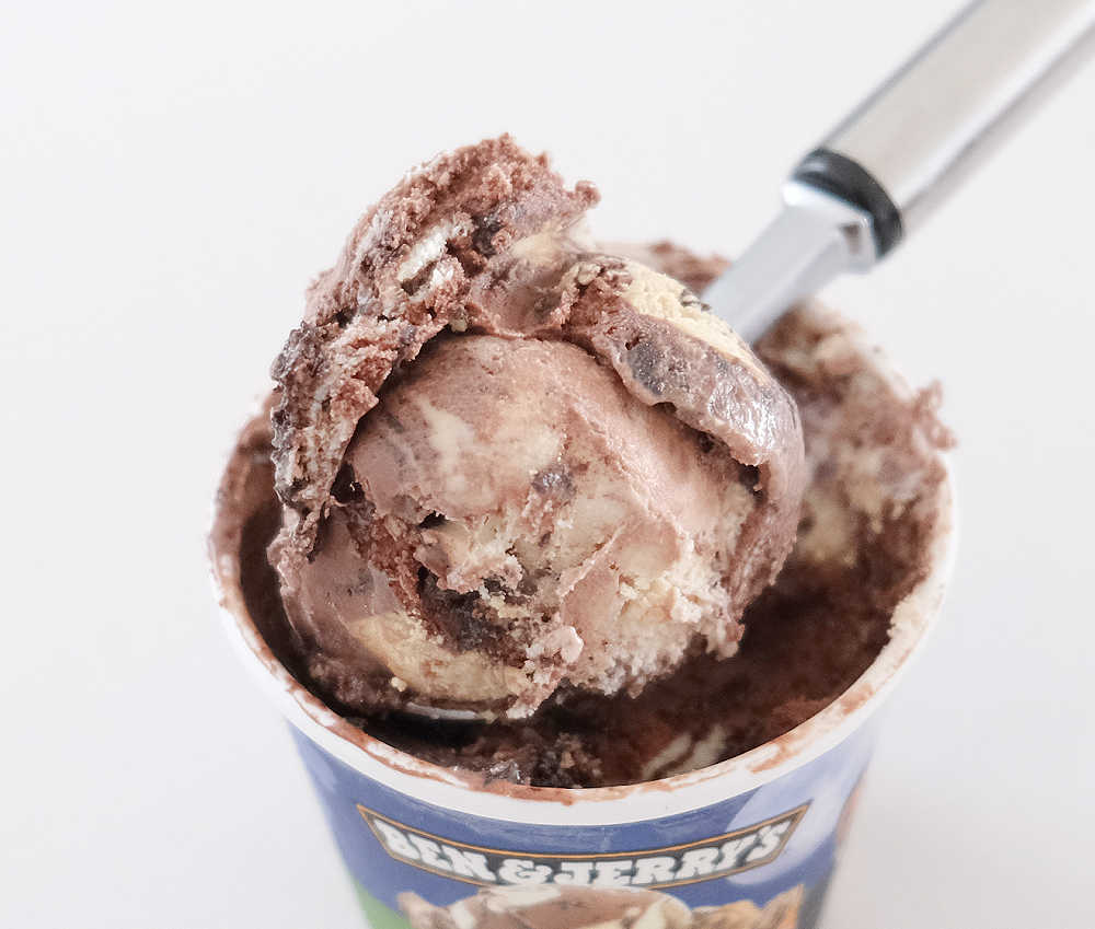 Closeup of a scoop of Ben & Jerry's The Tonight Dough.