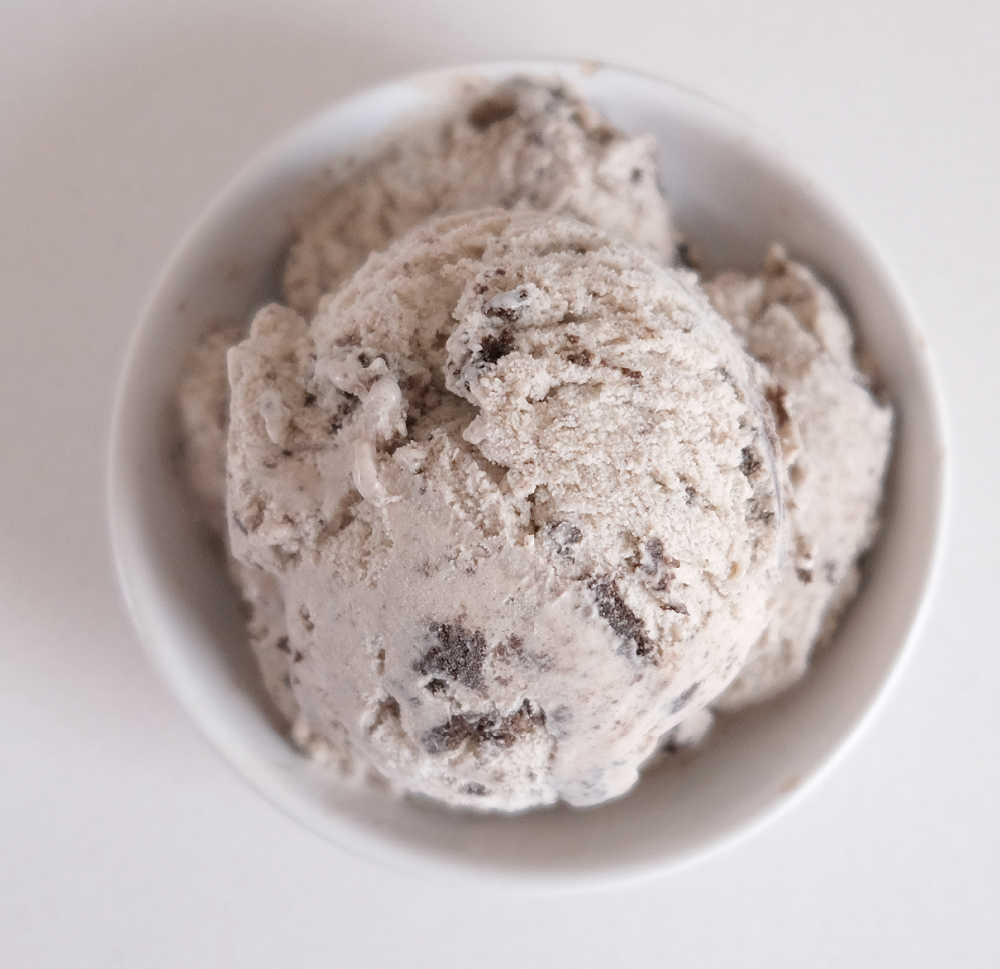 Top down image of Oreo ice cream in a bowl.