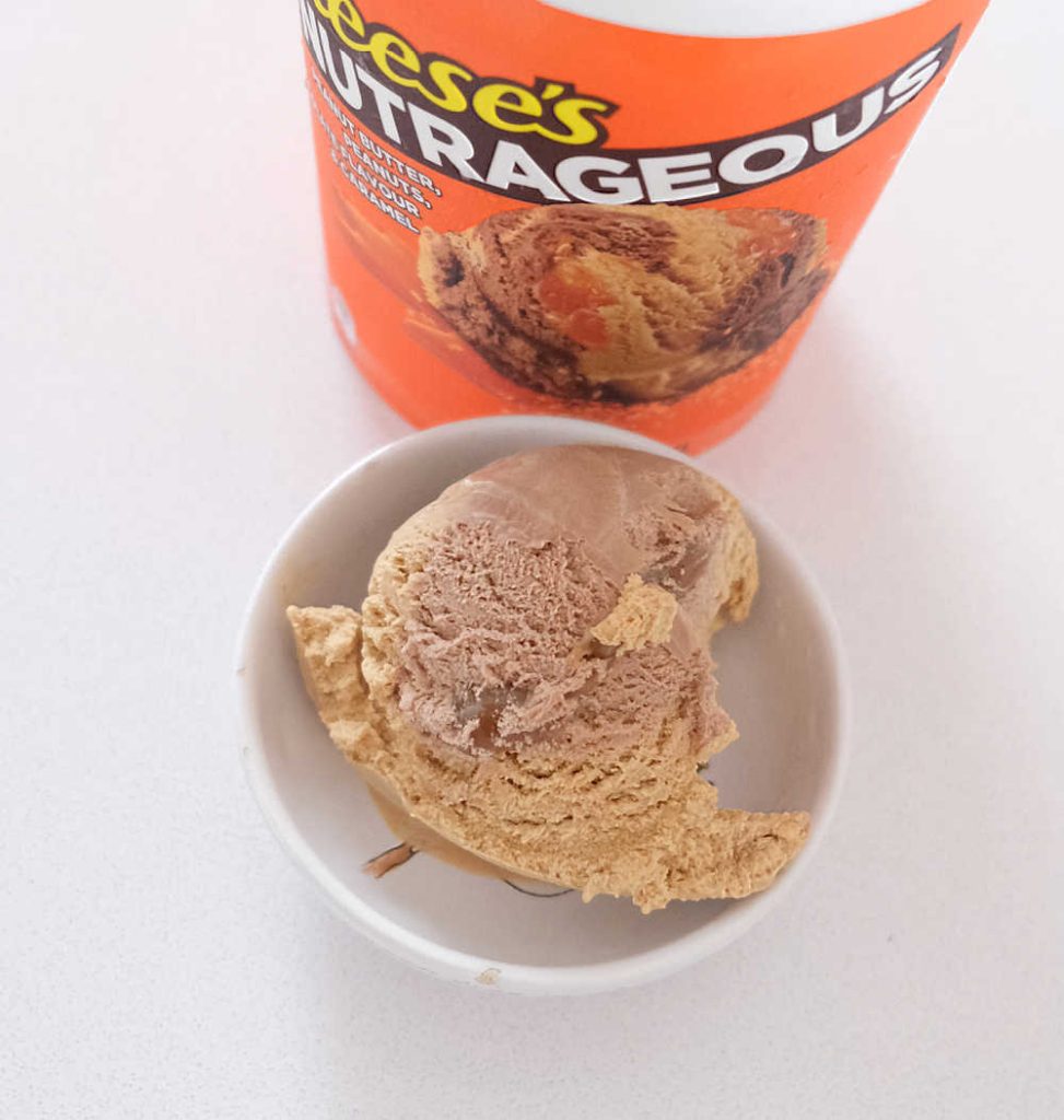 A bird's eye image of a bowl of Reese's Nutrageous and the pack next to it.
