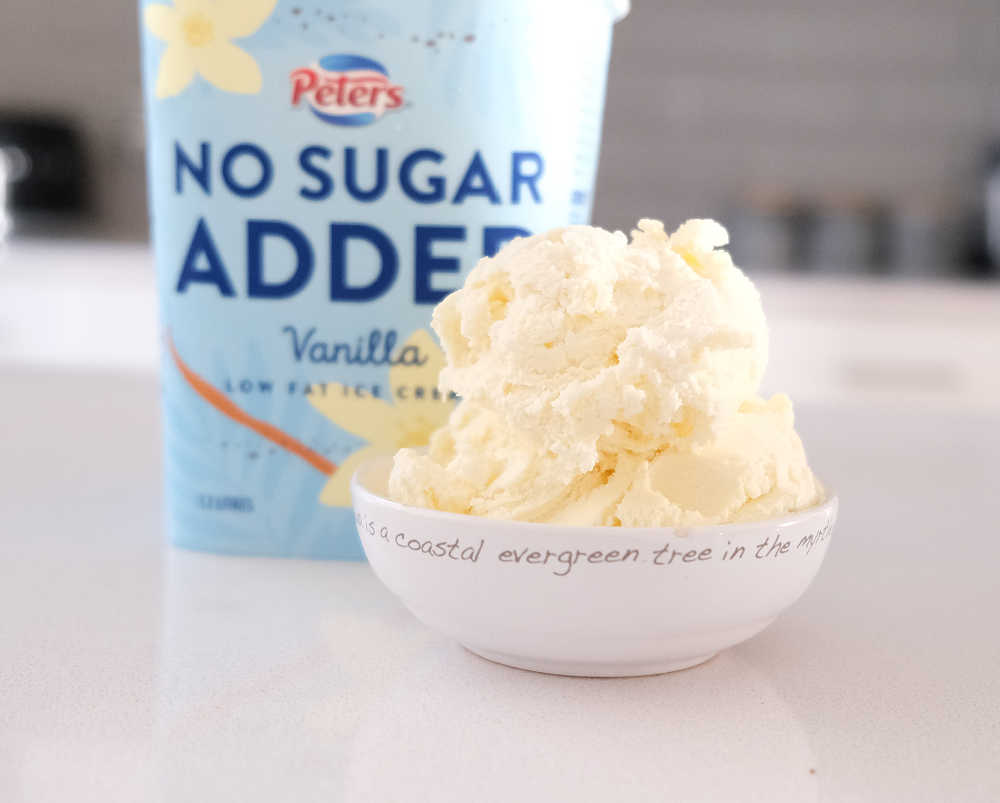 A bowl of Peters No Sugar Added Vanilla Low Fat Ice Cream.