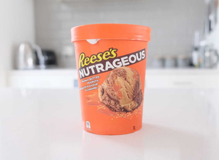 A tub of Reese's Nutrageous 1L on a kitchen bench.